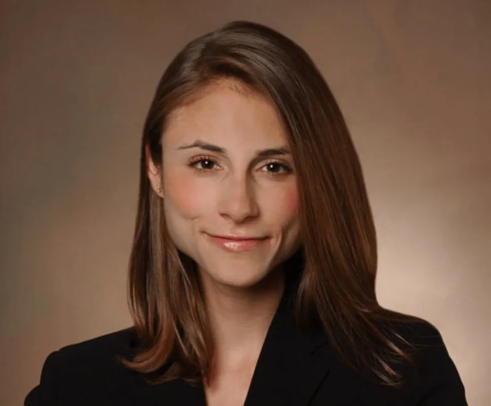 Terrie Absher Kochman, Licensed Medical Aesthetician using Omnilux LED mask for skincare results
